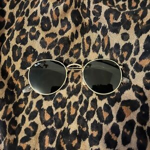 Round RAY BANS gold rimmed sunglasses